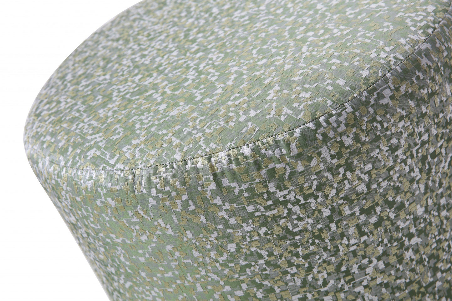 Close-up of a textured green fabric surface