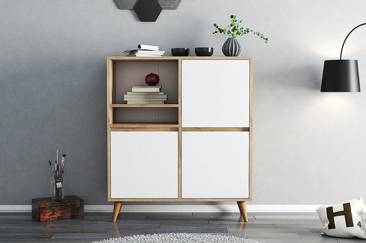 Modern wooden cabinet with white doors in a minimalistic room.