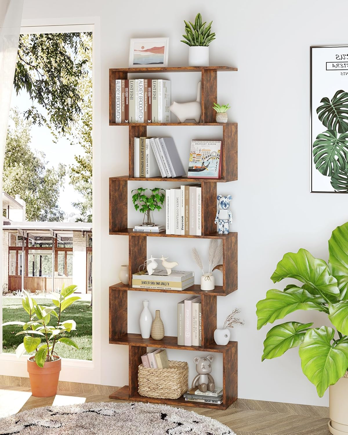 Wooden bookshelf with decorative items against a white wall with a window view.
