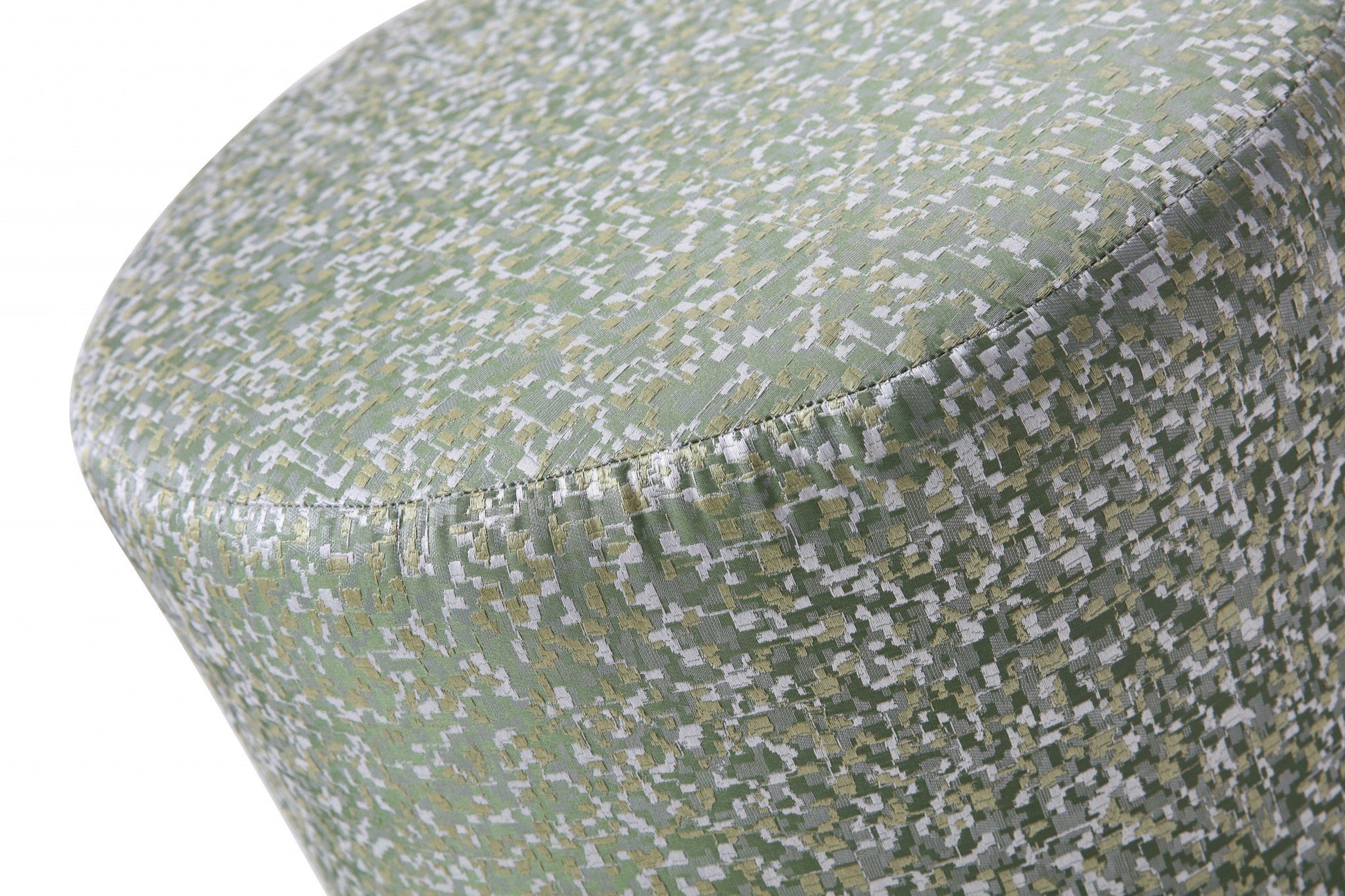Close-up of a textured green fabric surface