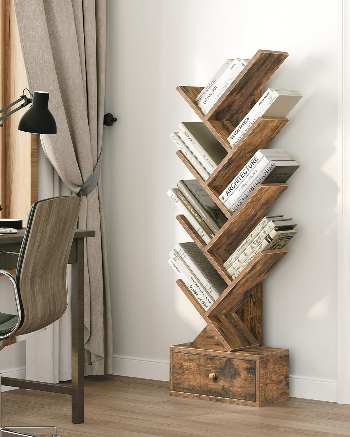 Wooden bookshelf with books and a drawer in a room setting.