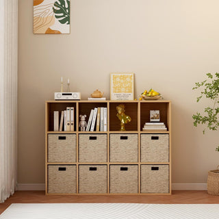 Wooden bookshelf with storage bins in a room with a plant and framed pictures.