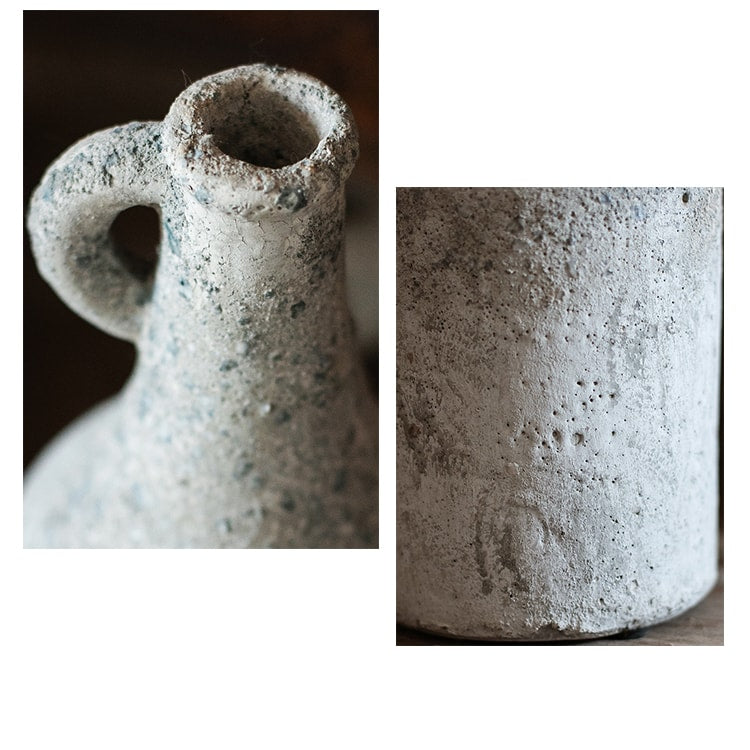 Ceramic vase with a textured surface on a white background