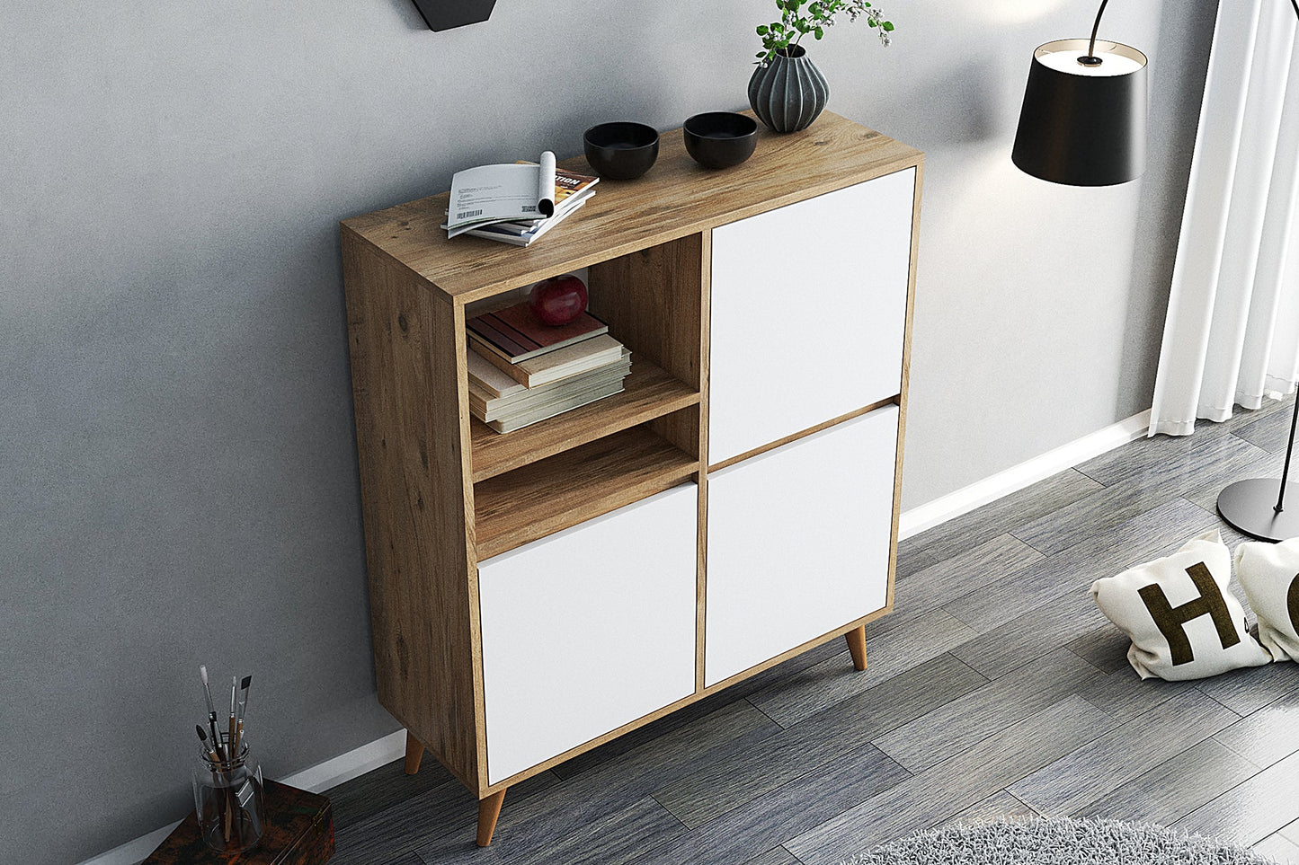 Wooden sideboard with white doors in a room setting