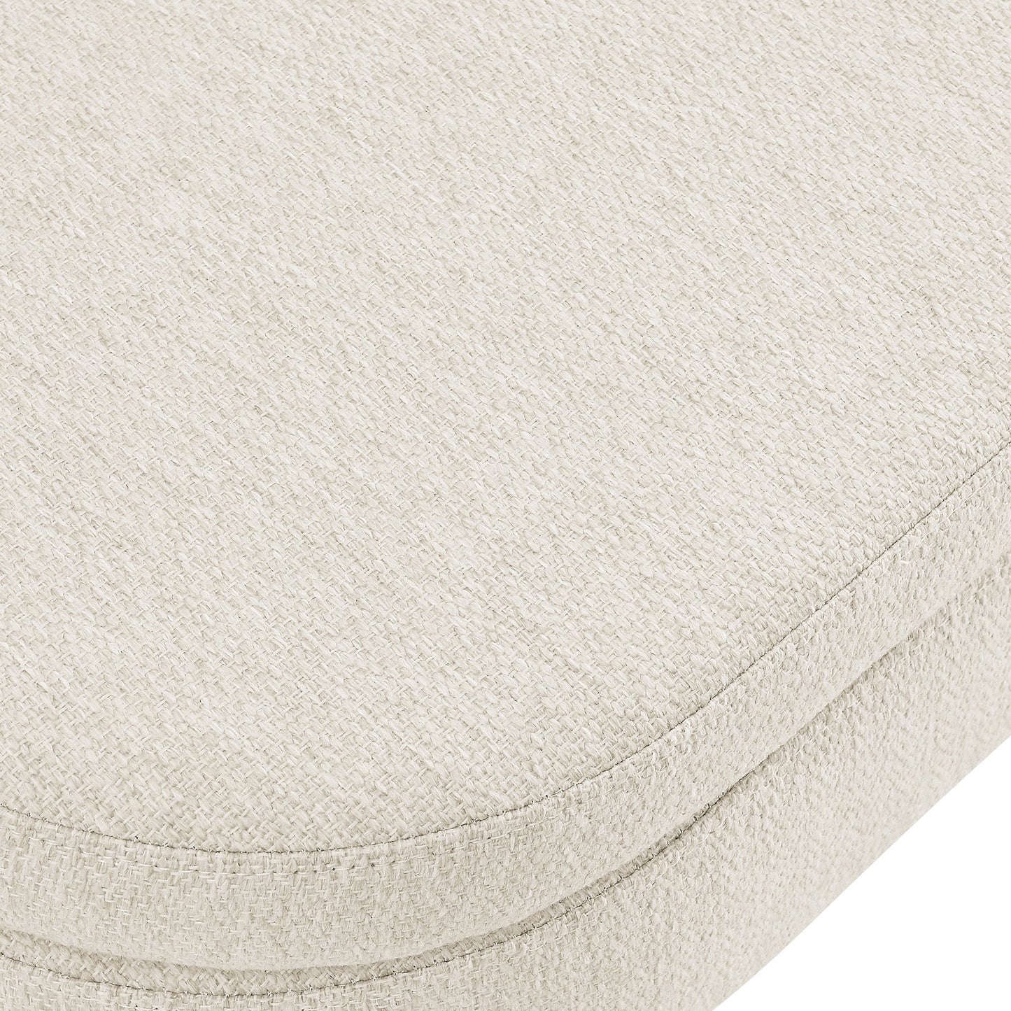 Close-up of a textured beige fabric surface