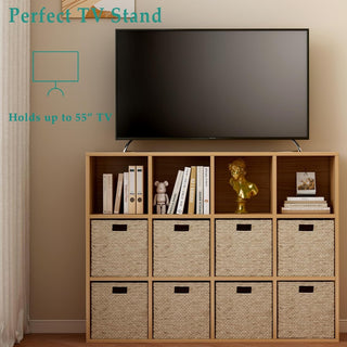 Wooden TV stand with storage baskets and a television mounted on it against a beige wall.