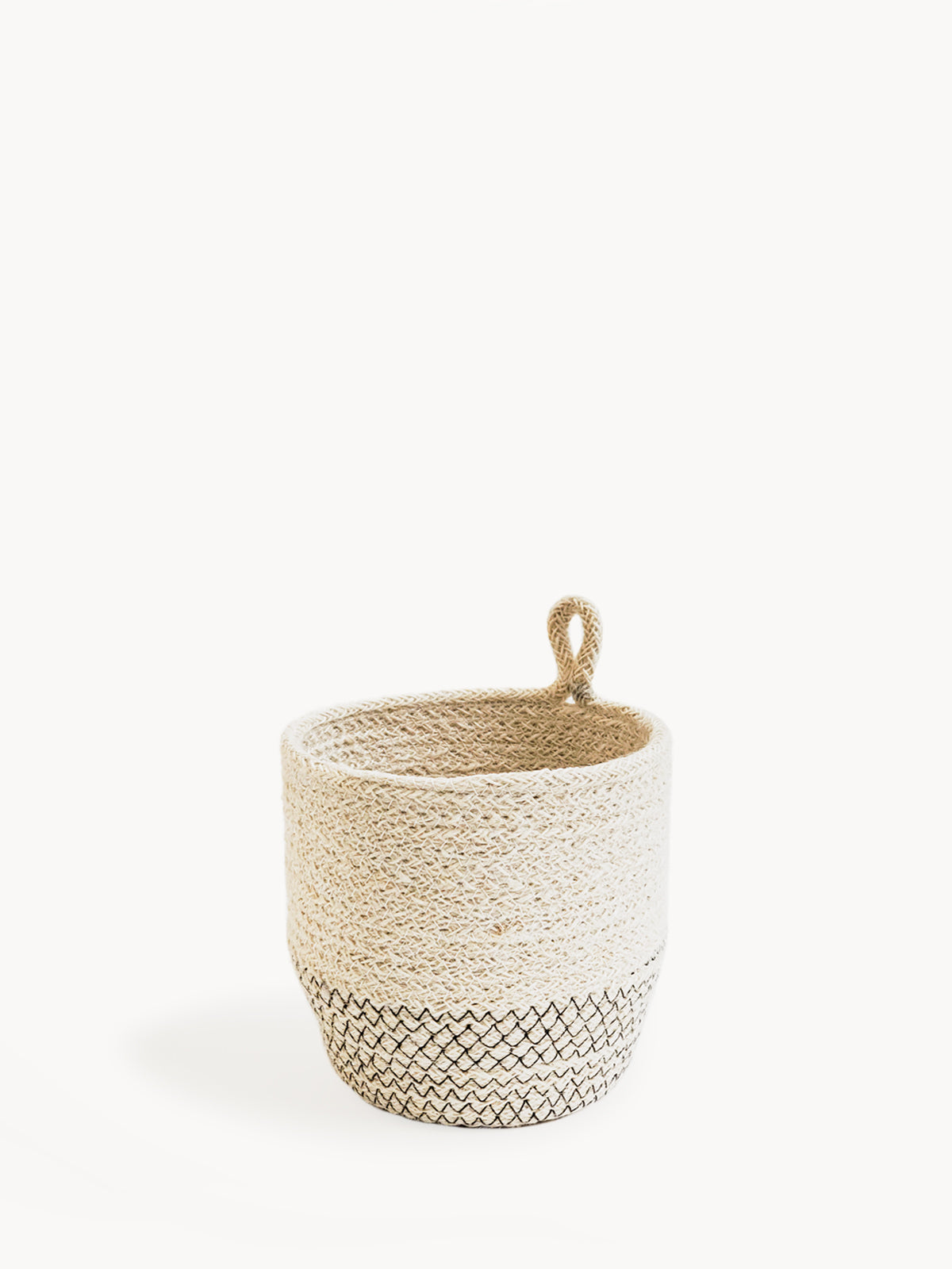 Woven basket with a textured base on a white background
