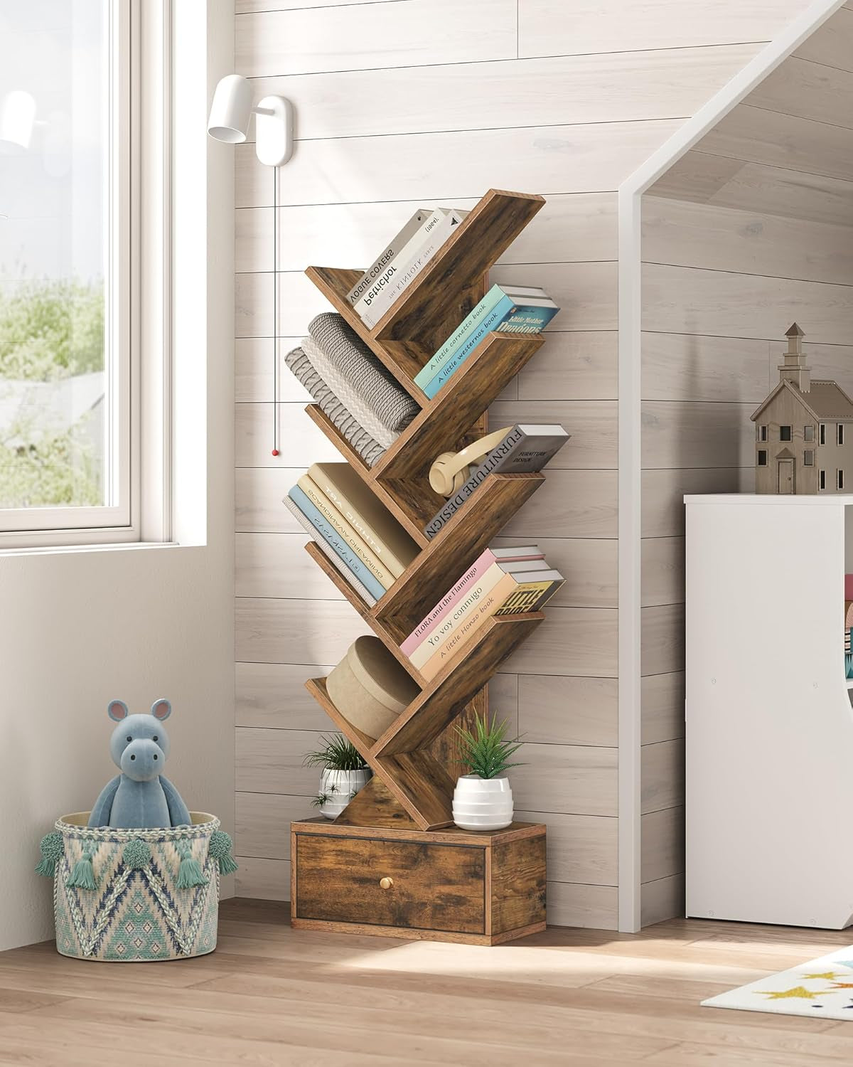 Wooden bookshelf with books in a room with a window and decorative items.